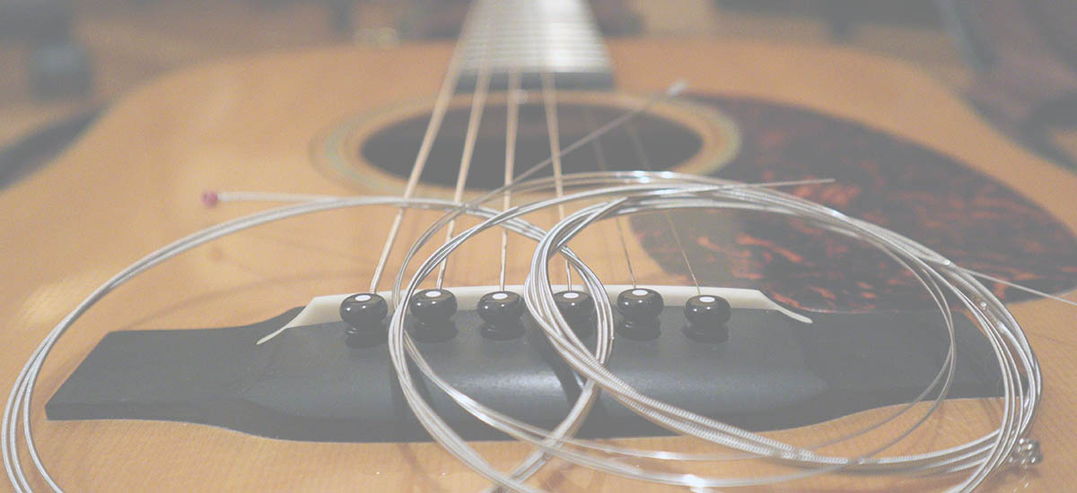 acoustic guitar strings on electric guitar